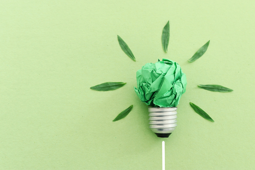 Green paper lightbulb